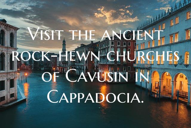 Visit the ancient rock-hewn churches of Cavusin in Cappadocia.